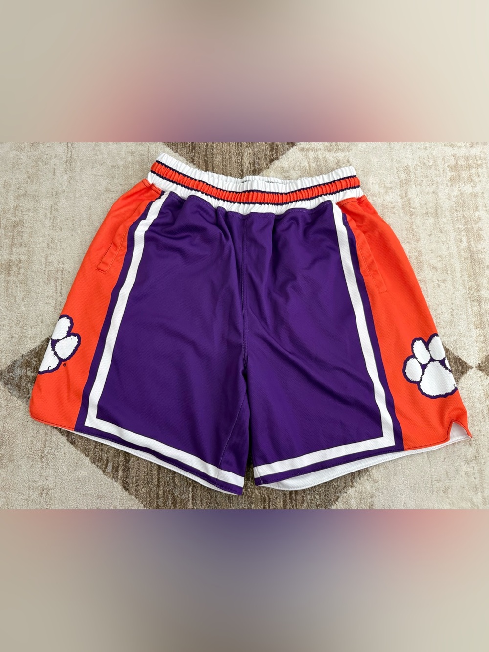 Men's Purple Athletic Shorts with Orange Side Panels and White Trim